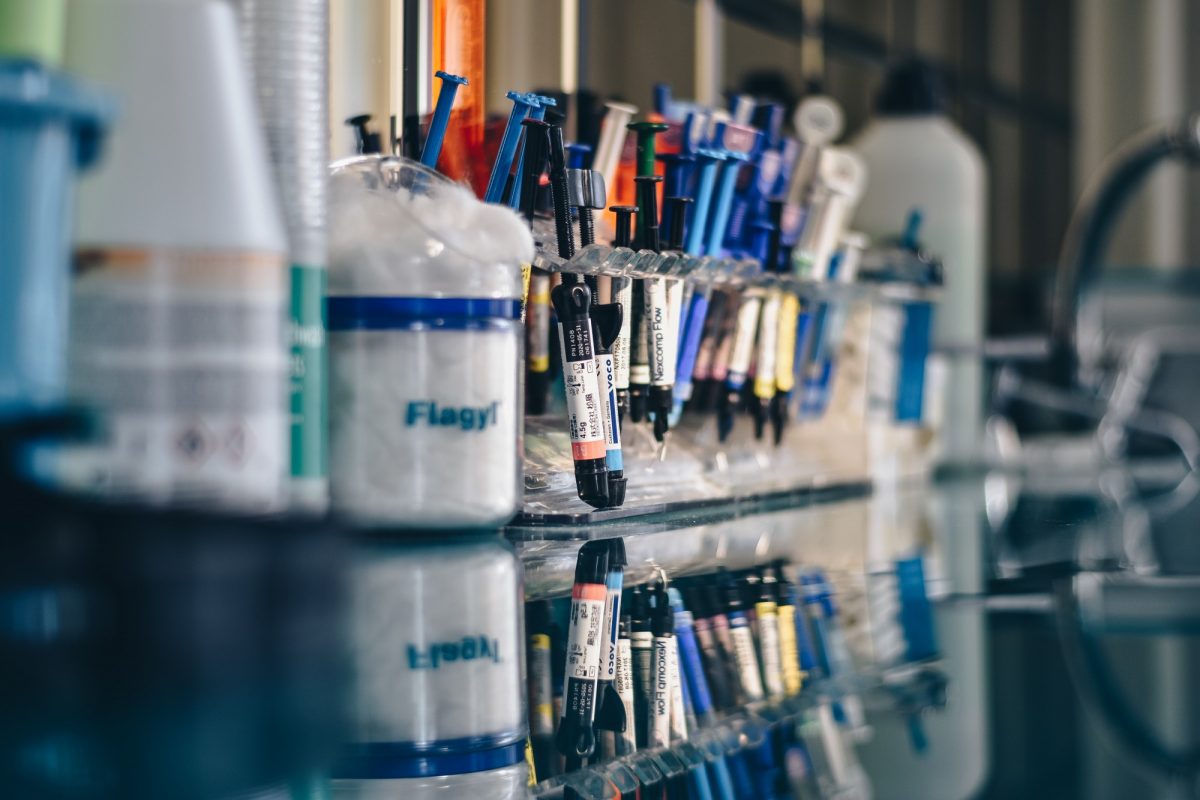 a collection of medicine on a laboratory desk