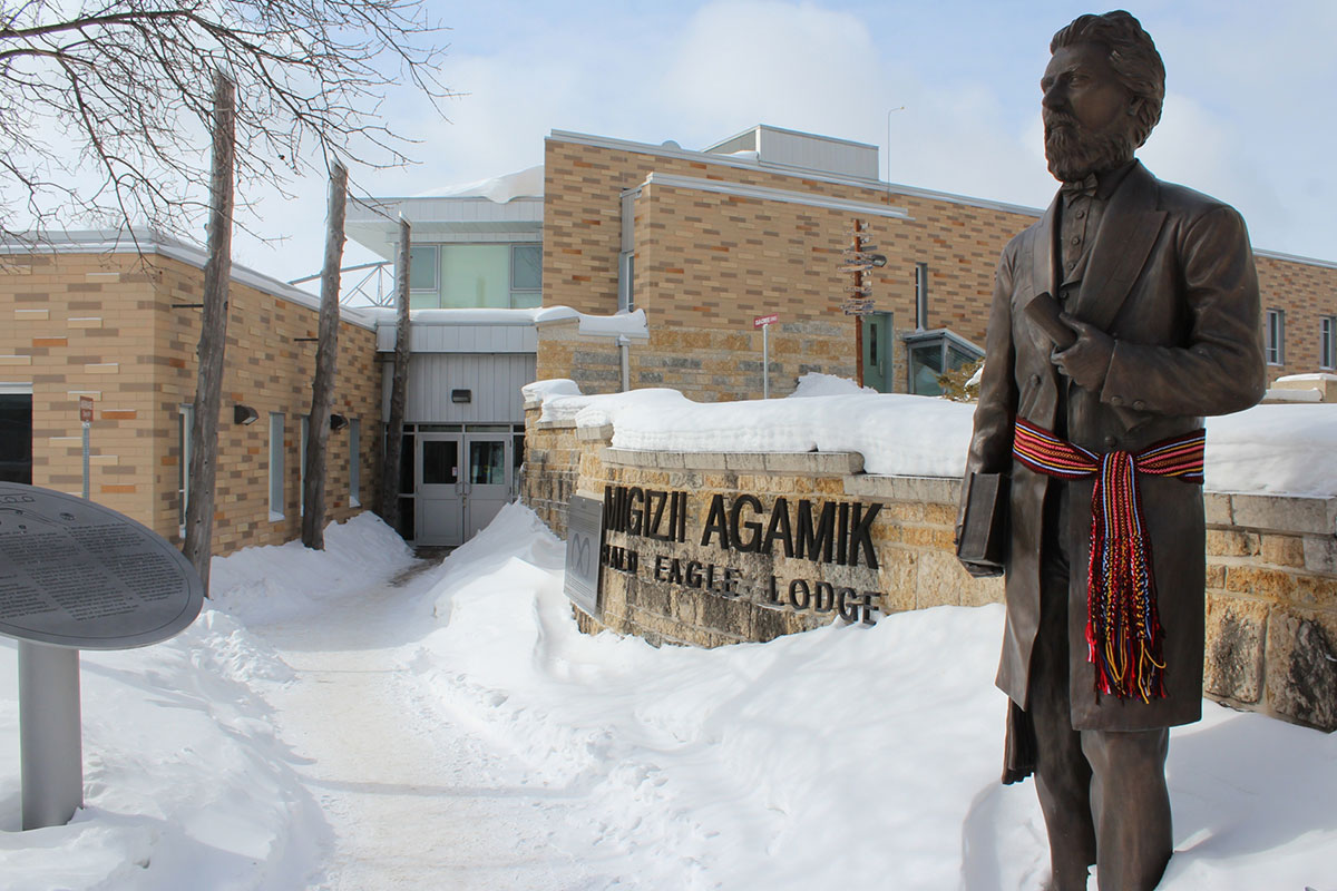 Louis Riel statue in front of Migizii Agamik - Bald Eagle Lodge