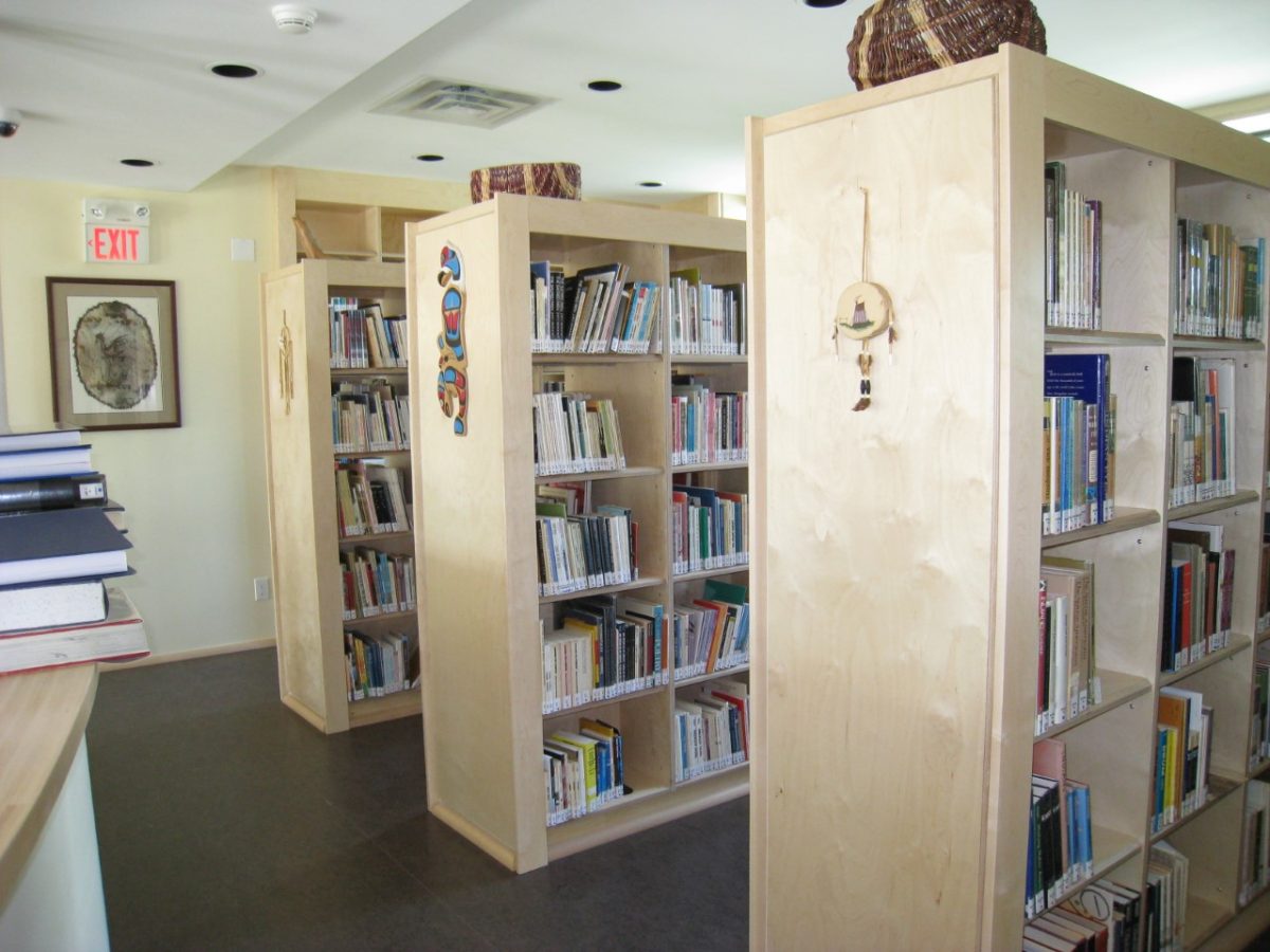 Rows of bookshelves at Manitoba Indigenous Cultural Education Centre.