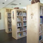 Rows of bookshelves at Manitoba Indigenous Cultural Education Centre.