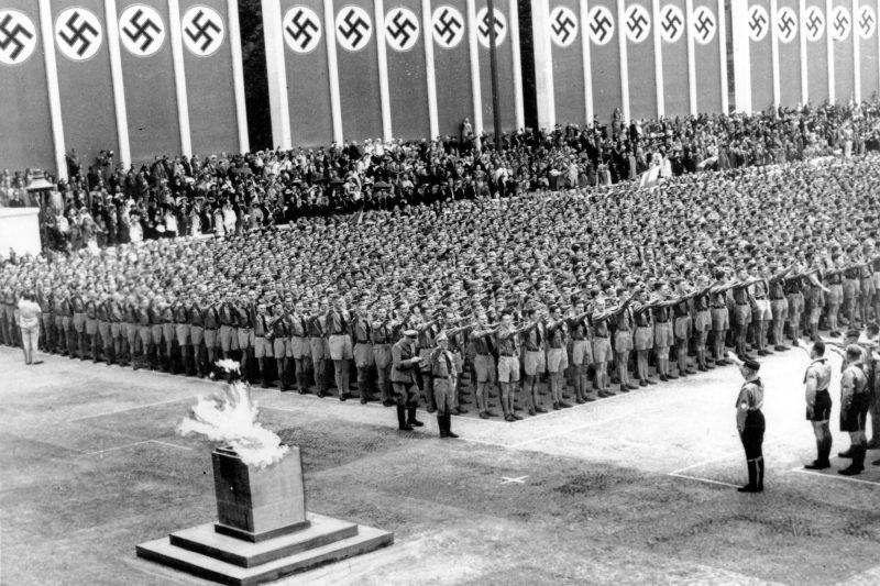  German Nazi soldiers line up at attention during the opening ceremonies of the 1936 Summer Olympic Games in Berlin. Some athletes boycotted the Berlin Olympics in an early example of athletes taking a political stand. // AP Photo/File