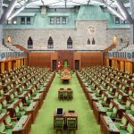 Photo shPhoto shows empty seats inside the House of Commons. // Image from Parliament of Canada/Facebook.