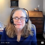 Law Professor Karen Busby wearing headphones on a Zoom call