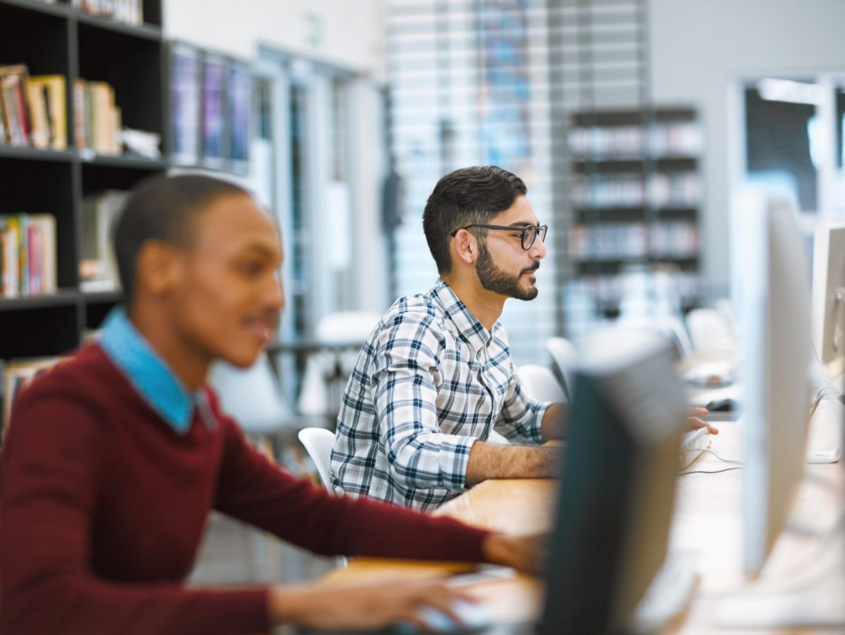 People working on computers looking at their screens