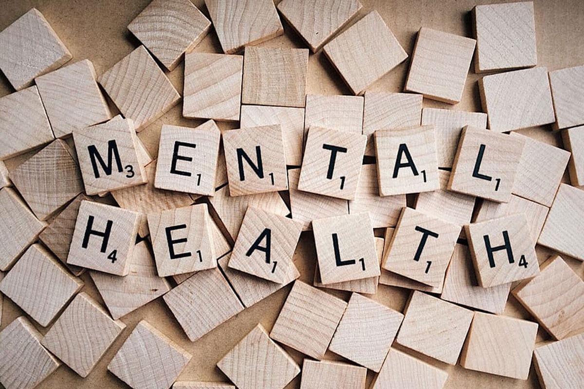 Scrabble tiles spelling out the words: mental health. // Image from Piqsels