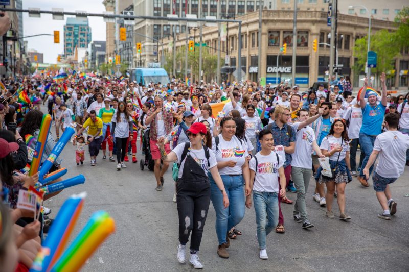 U of M volunteers on Pride Parade route, in 2019.