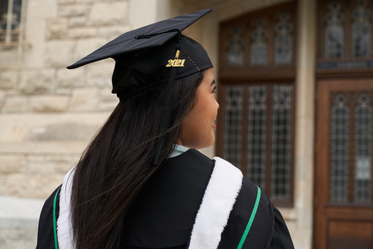 Graduating student in cap and gown