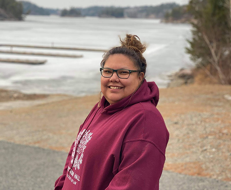 Photo of law student Daphne Comegan at her family home in Treaty 3 territory.