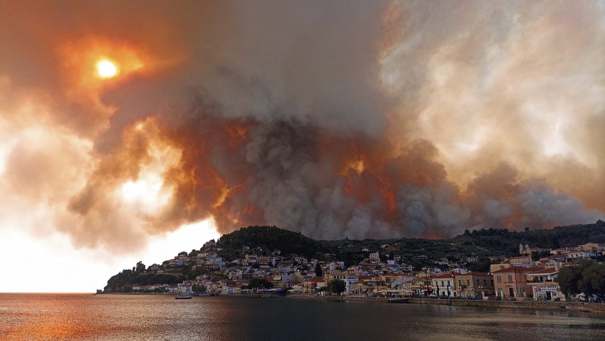 Wildfires burn on the island of Evia, north of Athens, Greece, on Aug. 3, 2021, as the country dealt with the worst heat wave in decades. Temperatures reached 41 C in parts of Athens. (AP Photo/Michael Pappas)