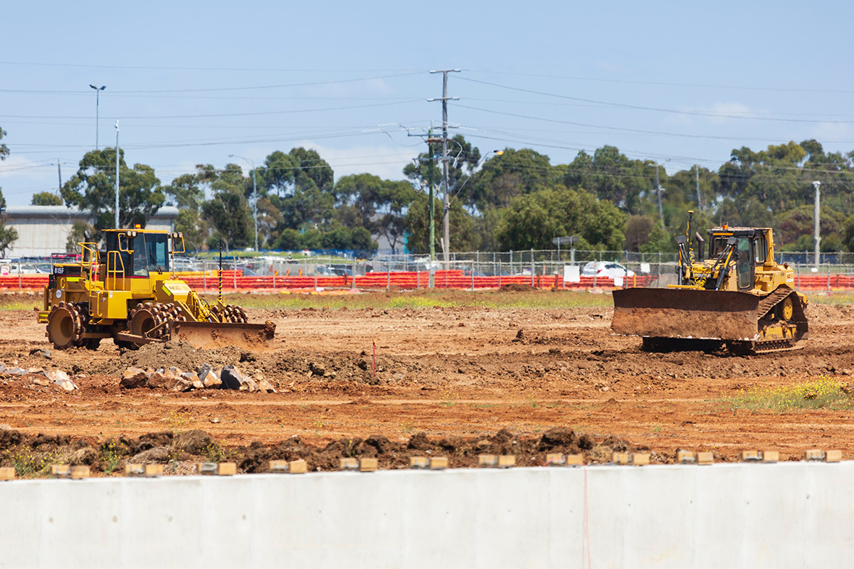 Bulldozers at a construction site. // Image from unsplash