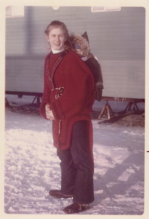 Christine Egan dressed warm with a baby in Pond Inlet in 1970.