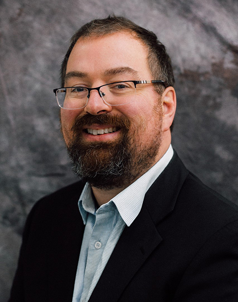 Headshot of Dr. Lyle McKinnon.