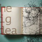 The words 'The Big Idea' are overlaid on top of a book and an illustration of networked lines.