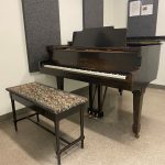 Piano in rehearsal room at the Desautels Faculty of Music