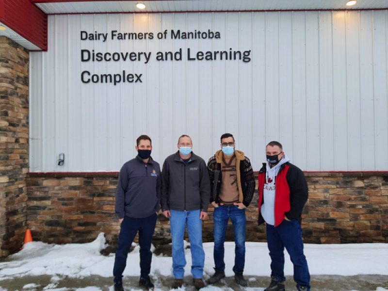 Dairy team in front of Dairy Farmers of Manitoba Discovery and Learning Complex