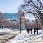Students walk on Fort Garry campus in winter