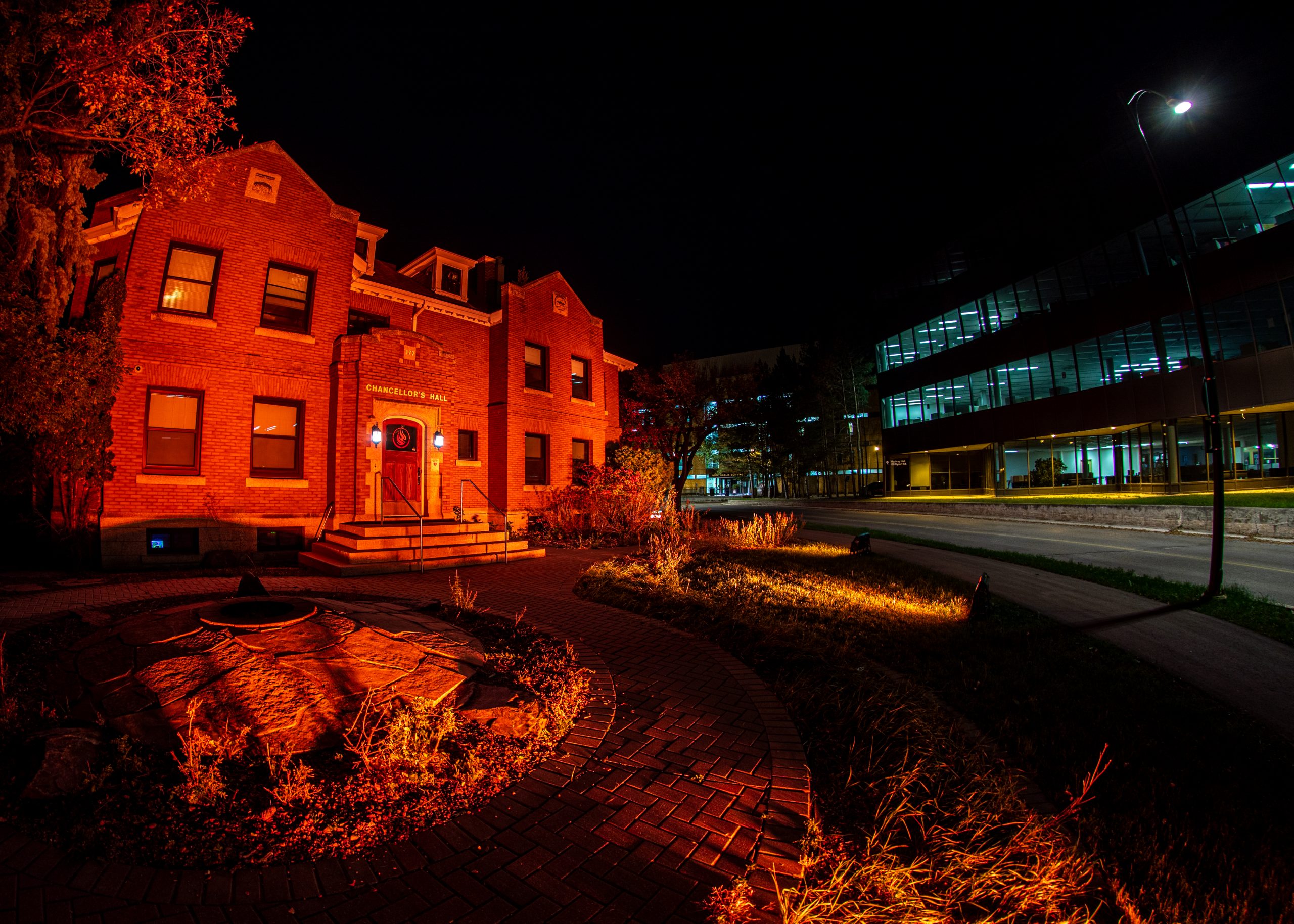 The NCTR building lit orange for National Truth and Reconciliation Day