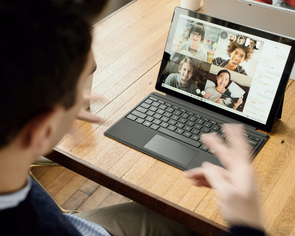 A student engages with peers online