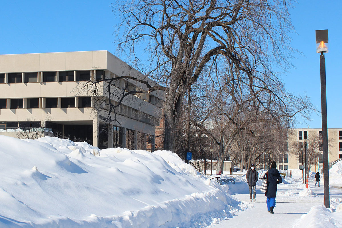 People walk outside UMSU University Centre in winter 2022. // Photo by Jack Rach