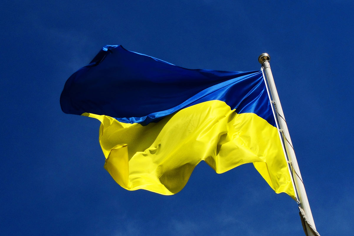 Ukraine flag is shown on flag pole. // Image from Piqsels