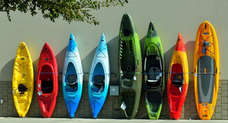 Row of different coloured kayas