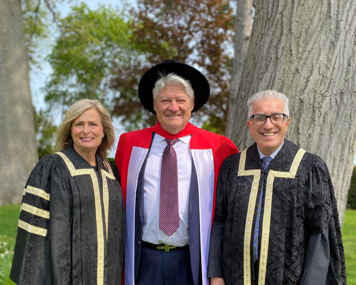 UM Chancellor Anne Mahon and President and Vice-Provost Michael Benarroch were on hand to present Dr. Donald Triggs (centre) with an Honorary Degree.