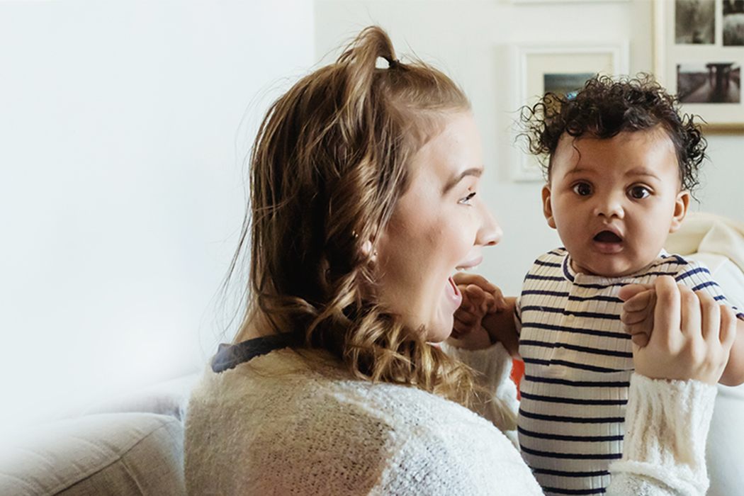 Parent and baby playing