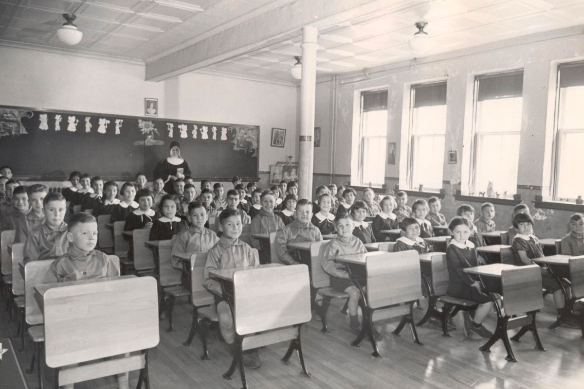 A black and white photo of the Shubenacadie Residential School classroom in Nova Scotia.