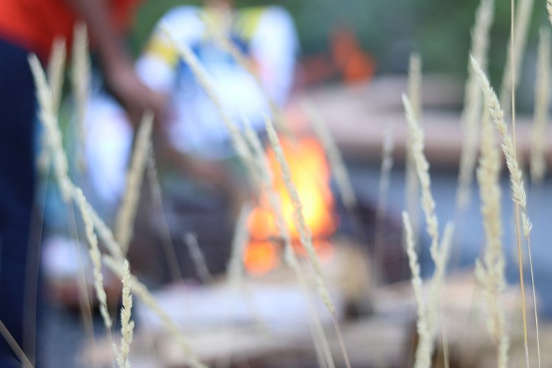 A ceremonial flame lit at the Mashkiki Gitigaan - Medicine Garden.