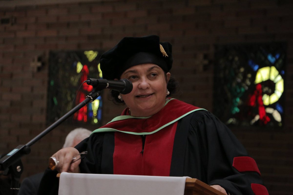 Dean of Studies of St. Paul's College at podium