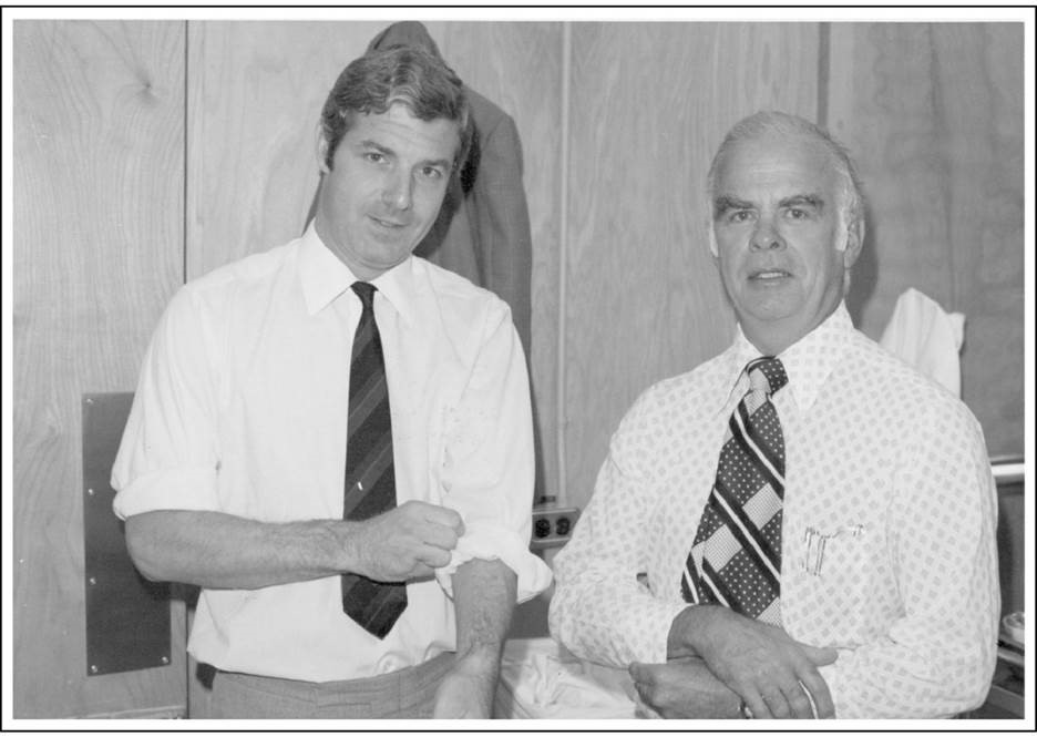 Dr. John Bowman (right) and Dr. Thomas Baskett prepare for a fetal transfusion in Winnipeg, in September 1976. 