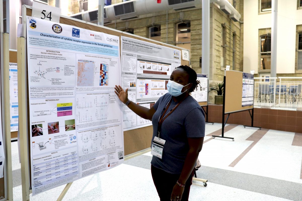 Medical microbiology and infectious diseases PhD student Ruth Mwatelah presents her poster