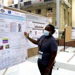 Medical microbiology and infectious diseases PhD student Ruth Mwatelah presents her poster