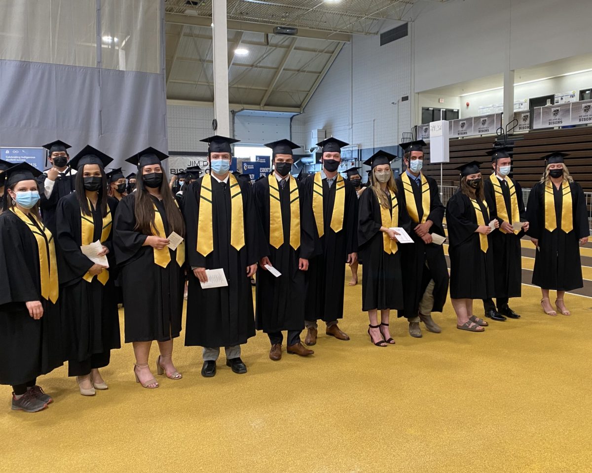 A group of graduates waiting to enter Convocation ceremony.