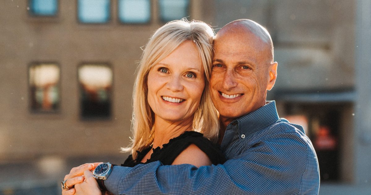 photo of Jennifer Schulz and Elliott Goszer embracing