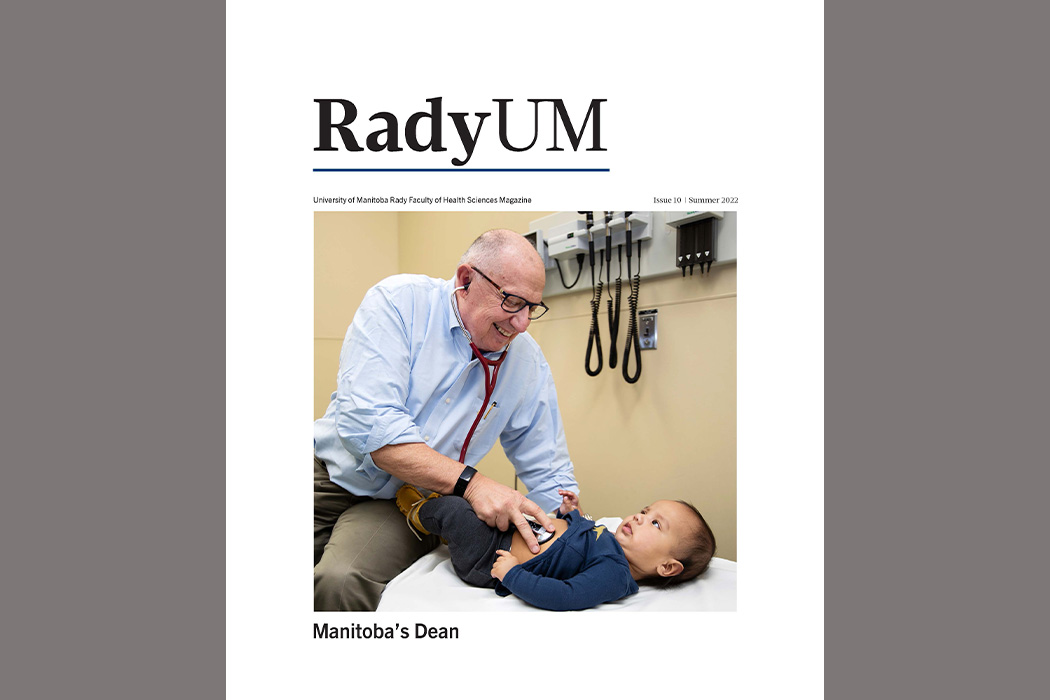 Cover of Summer 2022 issue of RadyUM magazine, showing Dr. Brian Postl giving a checkup to a baby.