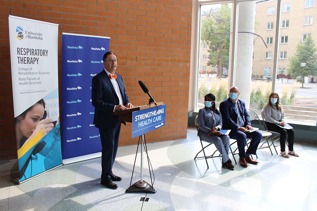 Rady Faculty of Health Sciences dean Peter Nickerson speaks at a media conference.