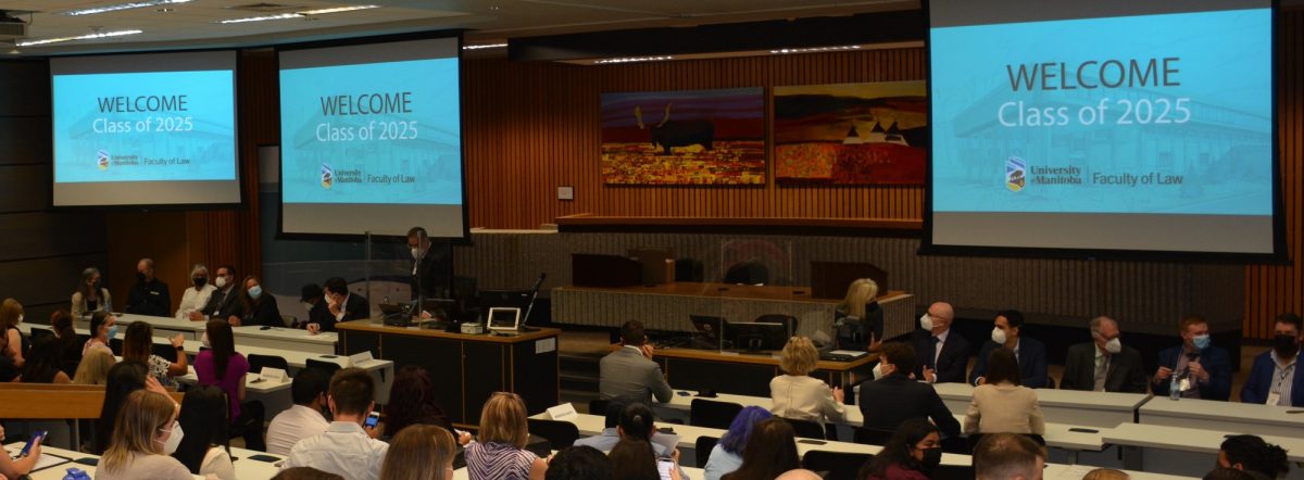 A large room full of law students at first year orientation