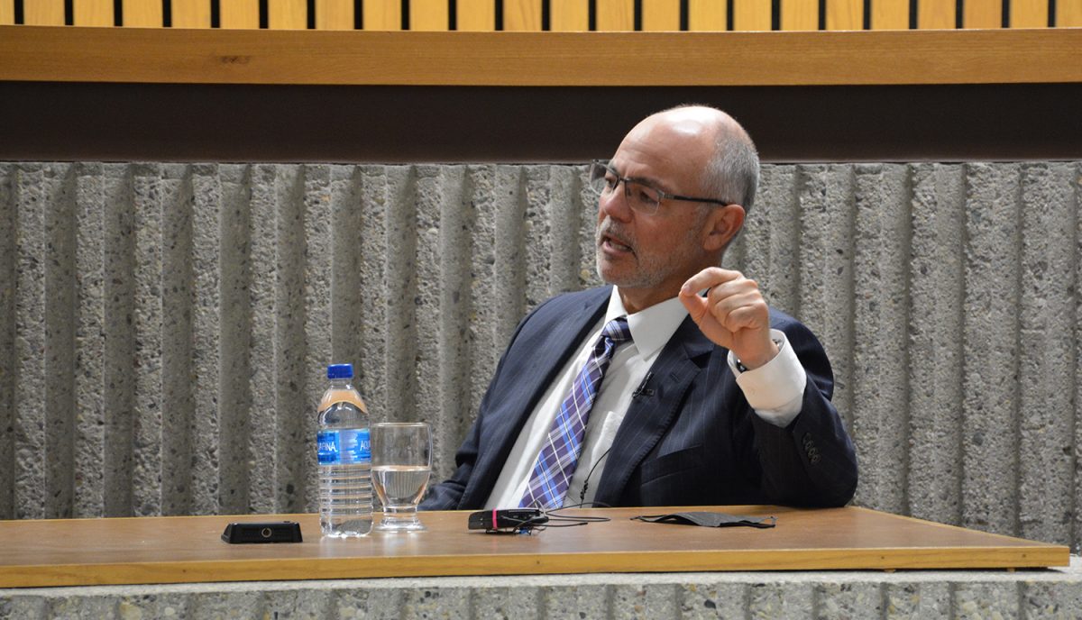 Photo of Supreme Court of Canada Justice Russell Brown speaking at Robson Hall's Moot Courtroom.