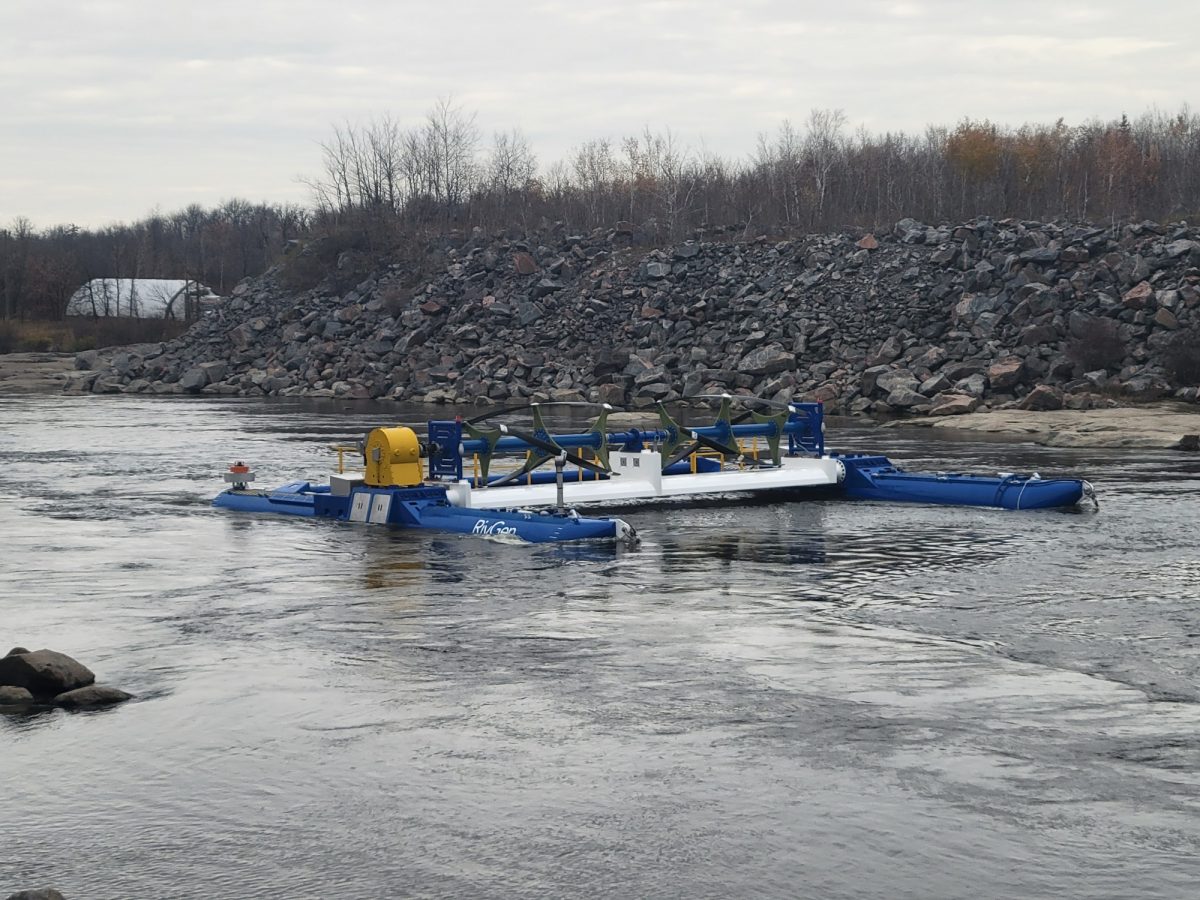 The rivgen turbine sits in the waters of the Winnipeg river.