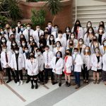 The PharmD Class of 2026 poses for a group photo after the White Coat Ceremony.