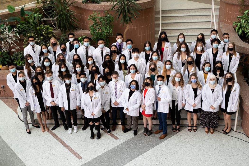 The PharmD Class of 2026 poses for a group photo after the White Coat Ceremony.