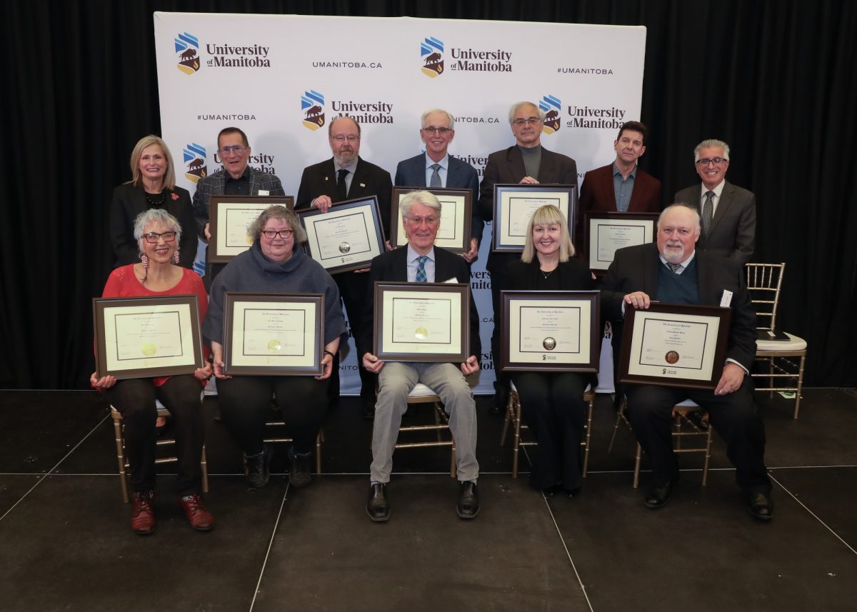 2022 Emeriti recipients pose with President Benarroch and Chancellor Mahon