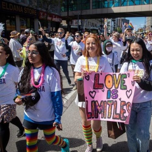 Students walking in a past Pride Parade.