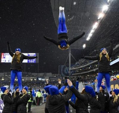 Members of the Blue Bombers Cheer and Dance Team execute a "field goal" routine. Photo credit: j.burzphotography
