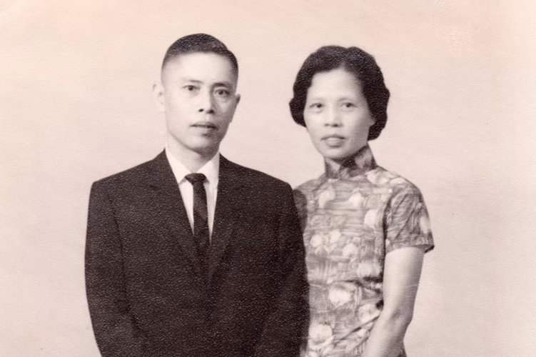 Mr. and Mrs. W.K. Kwan standing together.