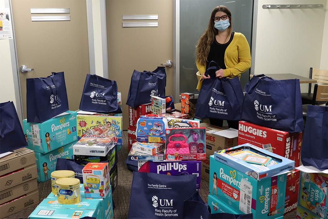 A room full of holiday basket with, children's toys and diapers.