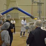A technician demonstrates the milling and fractionation technology at the Richardson Centre for Food Technology and Research.