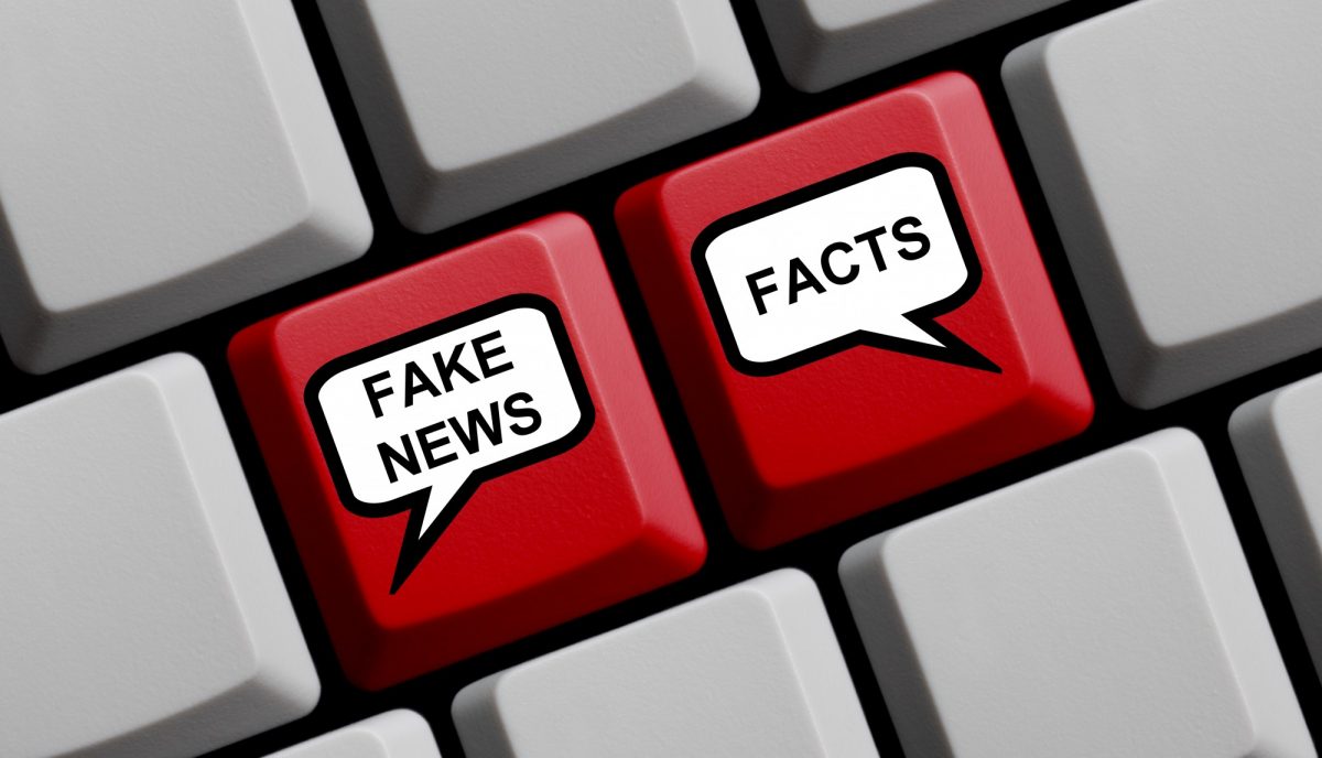 Photo of keyboard buttons with fake news and facts written on them.