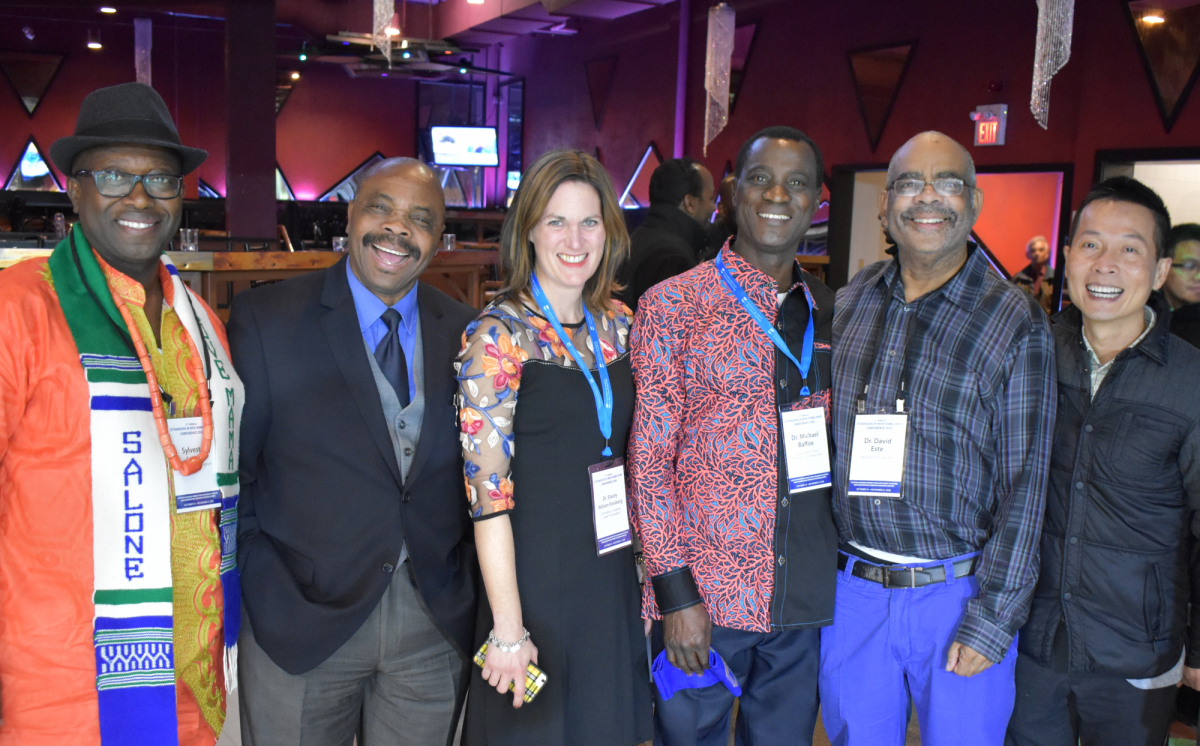 Strangers Conference Chair with Planning Committee Members and Guest Speakers